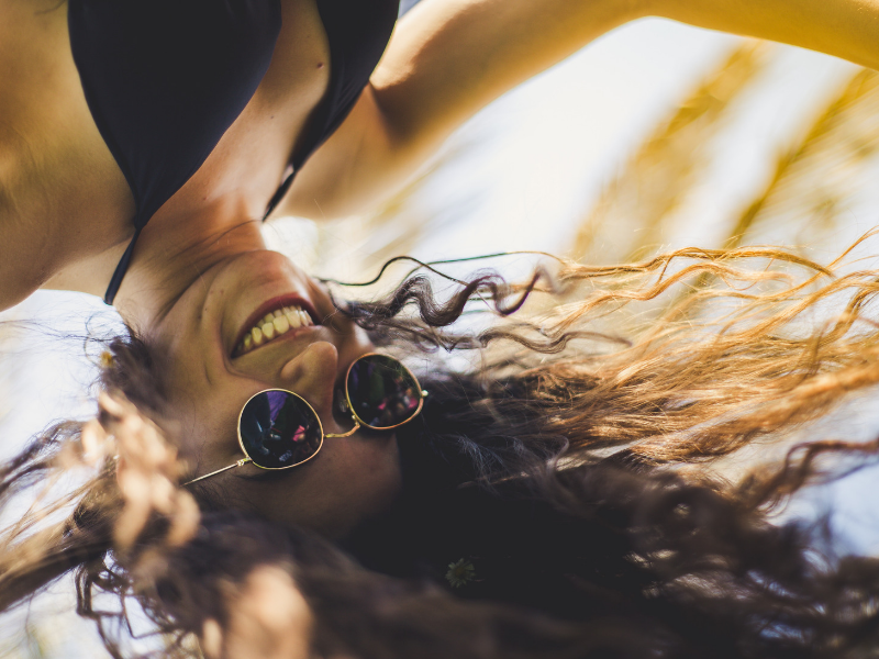 woman upside down and laughing